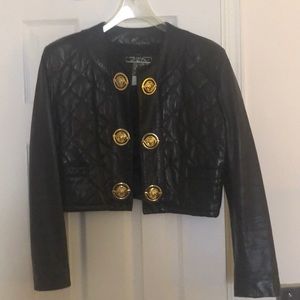 High end black leather jacket made in France.